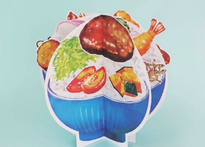 飛び出す食育工作ブック。どんぶりの形の台紙に料理のイラストが立ち上がる